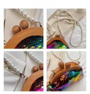 Detailed views of sequin evening bag with wooden frame and elegant pearl chain strap
