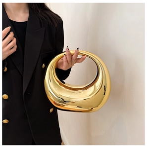 Glossy gold acrylic moon shaped evening clutch bag with metallic mirror finish for women