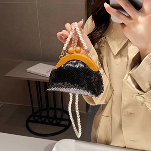 Elegant black sequin evening bag with pearl chain handle and wooden frame closure