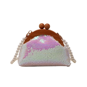 Elegant sequined shell bag with iridescent white finish and vintage wooden frame handle
