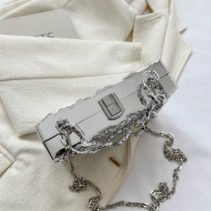Silver mirror acrylic box clutch bag with chunky chain strap and wavy metallic edges