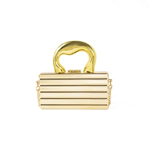 Elegant gold acrylic evening clutch bag with horizontal stripes and chunky top handle