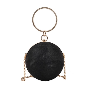 Spherical rhinestone evening bag in black with gold hardware and a round ring handle