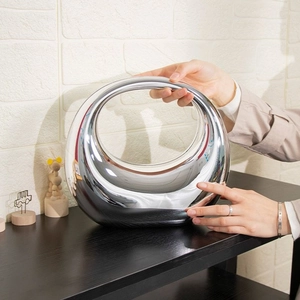 Silver mirror round acrylic handbag with modern gradient hollow circular design