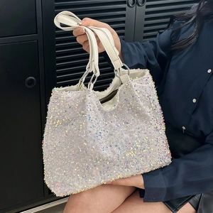 Sac à main blanc à paillettes avec effet nacré coloré et anses en cuir blanc