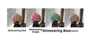 Detail of colorful shell-shaped evening clutches with metallic stripes and gold chain strap