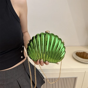 Fashionable green shell-shaped acrylic clutch bag with gold chain strap for women