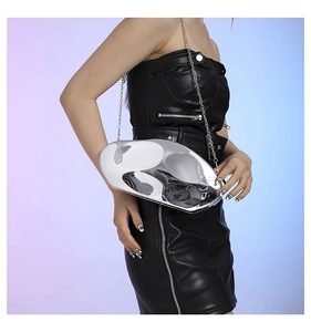 Modern irregular silver metallic box bag with reflective mirror finish and chain strap