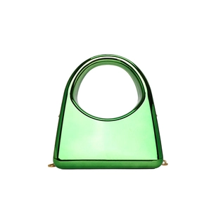 Modern transparent green acrylic evening bag with round handle and gold chain