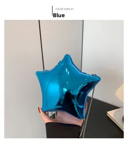 Detail of blue star-shaped acrylic hard shell clutch bag with metallic chain strap