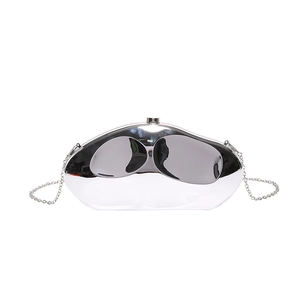 Silver sculptural hard shell clutch bag with metallic chain and irregular fluid design