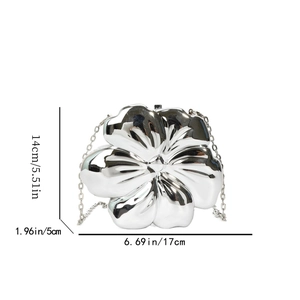 Detailed view of silver flower evening bag with dimensions 17cm by 14cm by 5cm
