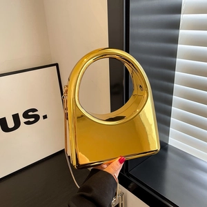 Fashionable gold acrylic evening clutch bag with circular handle and chain strap for women
