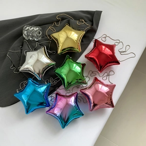 Star-shaped acrylic evening bags in candy colors with metallic chain straps