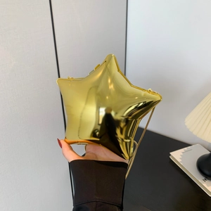 Chic gold star-shaped acrylic clutch bag with metallic mirror finish and chain strap