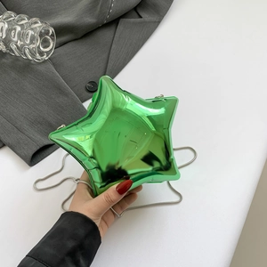 Star-shaped acrylic clutch bag in neon green with silver chain strap and mirror finish