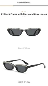 Détail de lunettes de soleil œil de chat noires avec double rangée de strass en cristal