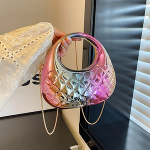 Iridescent quilted shell clutch bag with gold chain strap in gradient metallic colors
