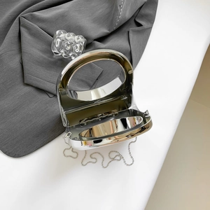 Silver mirror acrylic clutch bag with large round handle and detachable chain strap