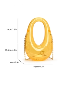 Detail view of orange acrylic egg-shaped evening bag with dimensions and gold chain