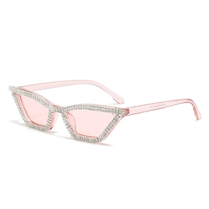 Lunettes de soleil œil de chat pour femmes avec monture rose et bords en strass