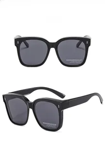 Polarized square frame sunglasses with black frame and grey lenses for a stylish look
