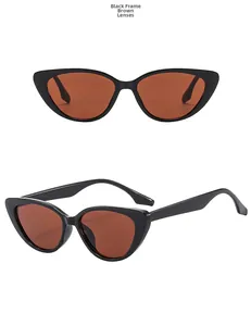 Detailed view of cat eye sunglasses with black frames and brown tea lenses