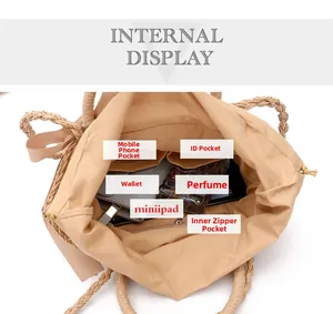 Internal view of straw beach tote bag with drawstring lining and functional compartments