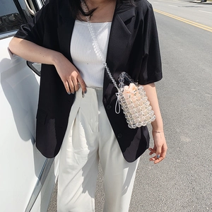 Transparent acrylic pearl beaded bucket bag with peach drawstring satin pouch