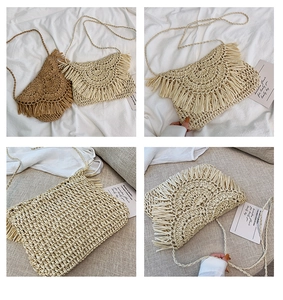 Detail of woven straw shoulder bag with fringe tassel and handmade texture