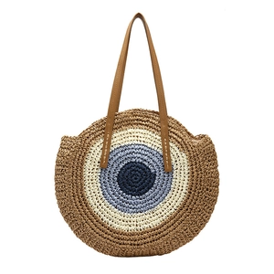 Sac à bandoulière rond en paille tressée avec motif circulaire multicolore de plage