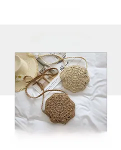 Detail of hollow woven texture on handmade crochet summer beach bags in beige and brown