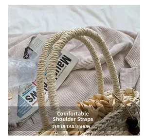 Detail of hand-woven straw bag texture with beige drawstring lining and round wood beads