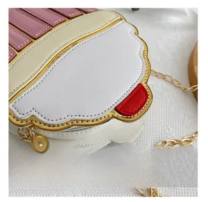 Detail shot of ice cream burger creative handbag with golden chain and colorful PU material