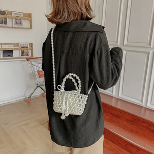 Sac seau en perles tissées main avec nœud en ruban élégant pour un style bandoulière