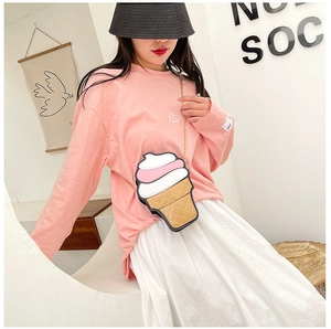 Detail of creative ice cream crossbody bag with pink leather and gold chain strap