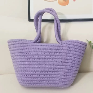 Detailed texture of purple hand-woven cotton rope tote bag for summer casual outings