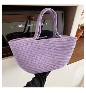 Close-up of lilac woven cotton tote bag with thick texture and sturdy double handles