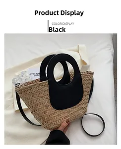 Detail of woven straw bucket bag with black leather trim and detachable shoulder strap