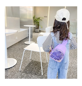 Detail of purple kid's chest bag with glittery quicksand effect and clear PVC window