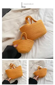 Macro view of bright orange woven cotton rope bags showing spiral texture details