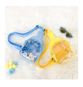 Detail of transparent PVC kids chest bag with colorful sequins and adjustable strap