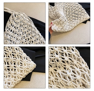Macro detail of hand-woven cotton mesh and sturdy handle on cream summer beach bag