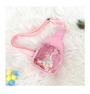Detailed close-up of pink PVC chest bag with colorful quicksand sequins and woven strap