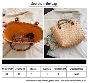 Fashionable large straw woven tote bag with bamboo handles and size chart for beach vacation