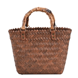 Fashionable dark brown woven straw bag with bamboo handles and large capacity