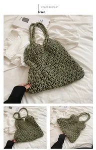 Detail of green woven hollow mesh tote bag showing handmade craft texture and handles