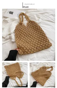 Detail of khaki woven mesh beach bag showing handcrafted hollow knot texture and handle