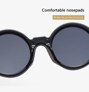 Detail of ergonomic integrated nose pads on classic round punk sunglasses for comfort
