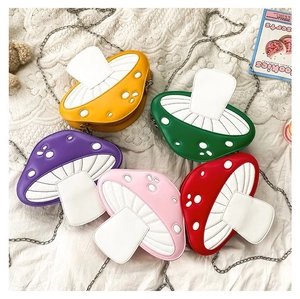 Detailed collection of colorful mushroom-shaped crossbody chain bags with polka dots